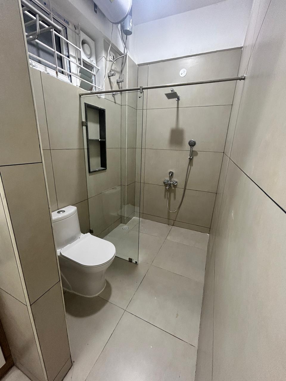 Bathroom with glass shower partition